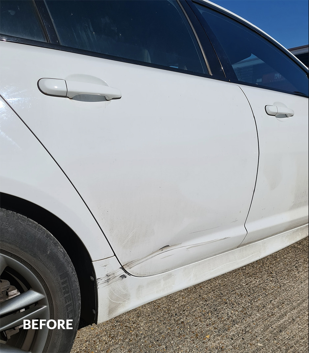 White jaguar car damage pre-insurance claimed repair